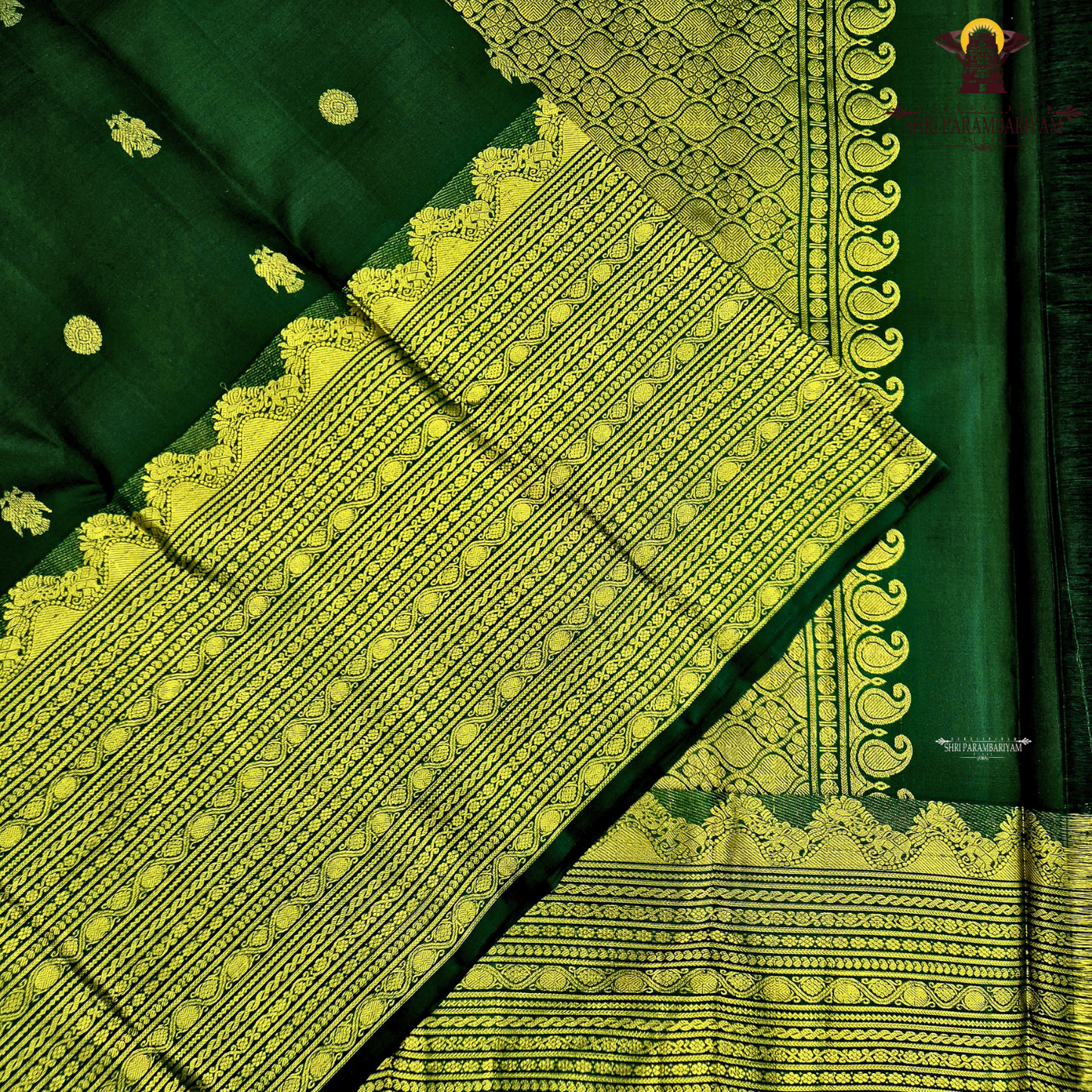 A deep Bottle Green with luxurious gold zari weaving Saree