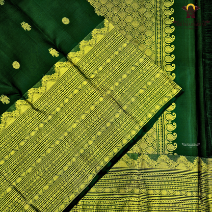 A deep Bottle Green with luxurious gold zari weaving Saree
