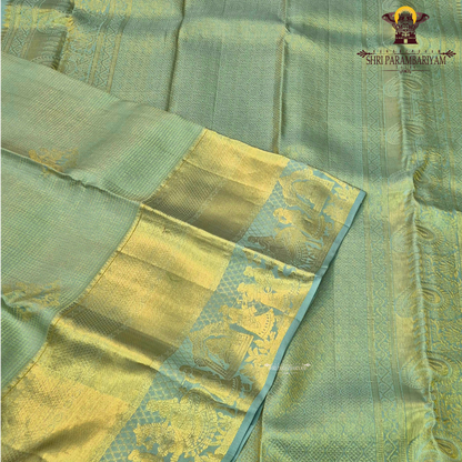 A refreshing blend of pastel pista green / mint green body paired Saree