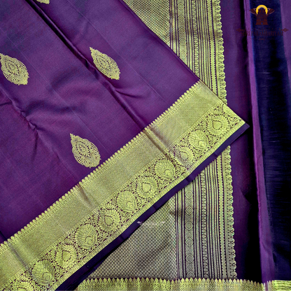 A rich Wine Maroon / Deep Burgundy with a subtle dual-tone silk sheen Saree