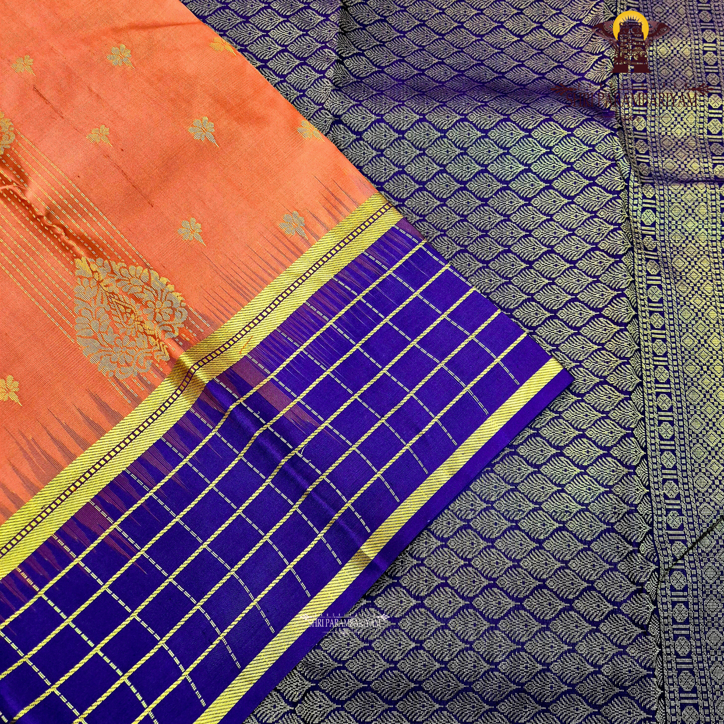 A striking reddish-orange (rust orange) Saree