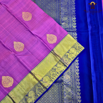 A vibrant magenta purple shade, featuring elegant zari Saree