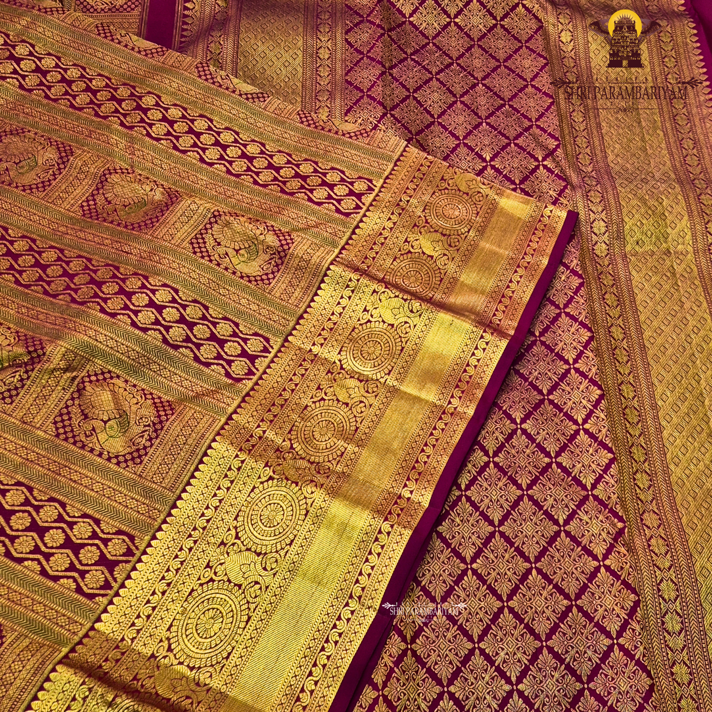 Deep magenta-red (rani red tone) with rich antique gold zari Saree