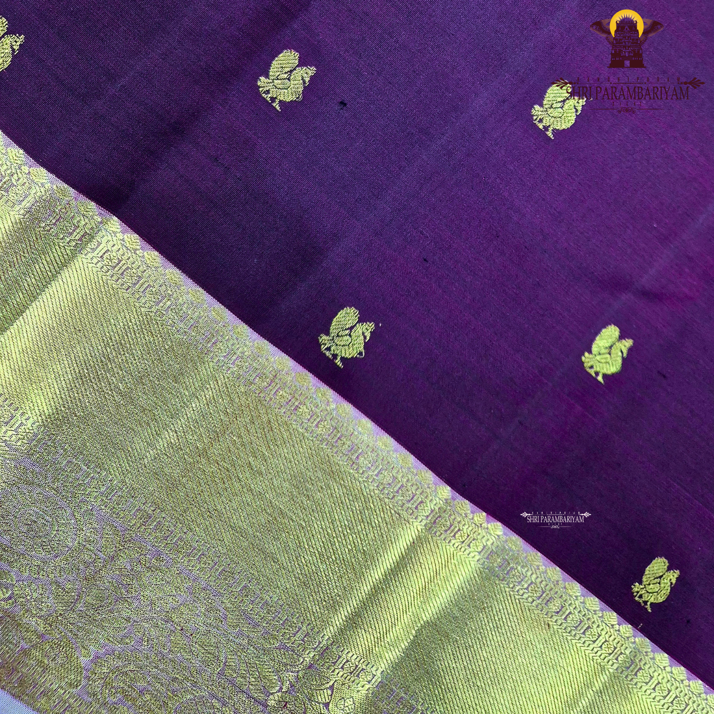 Rich deep maroon (wine shade) body with a lustrous gold zari Saree