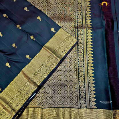 A classic Dark Bottle Green with rich Gold zari Saree