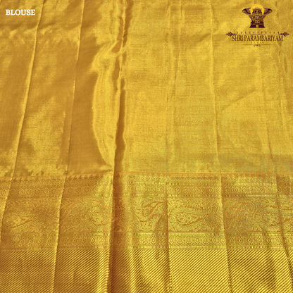 A rich antique gold shade that radiates elegance and traditional charm Saree