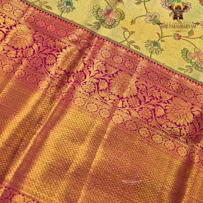A rich golden tissue body with a vibrant rani pink (magenta) border Saree