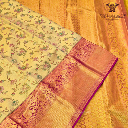 A rich golden tissue body with a vibrant rani pink (magenta) border Saree