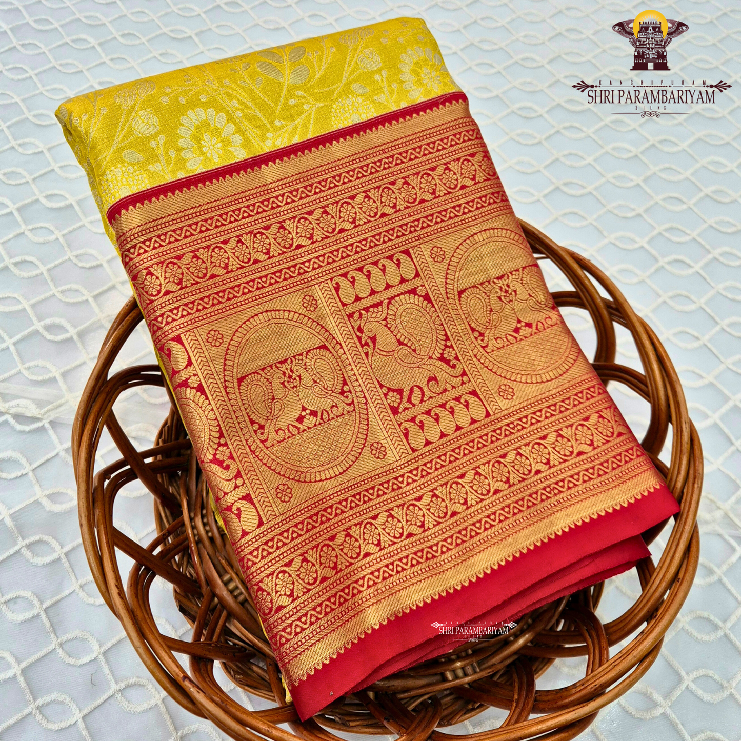 Bright lemon yellow with Contrast deep red border Saree