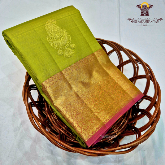 A lime Green (yellowish green tone) with Rich Gold zari border Saree