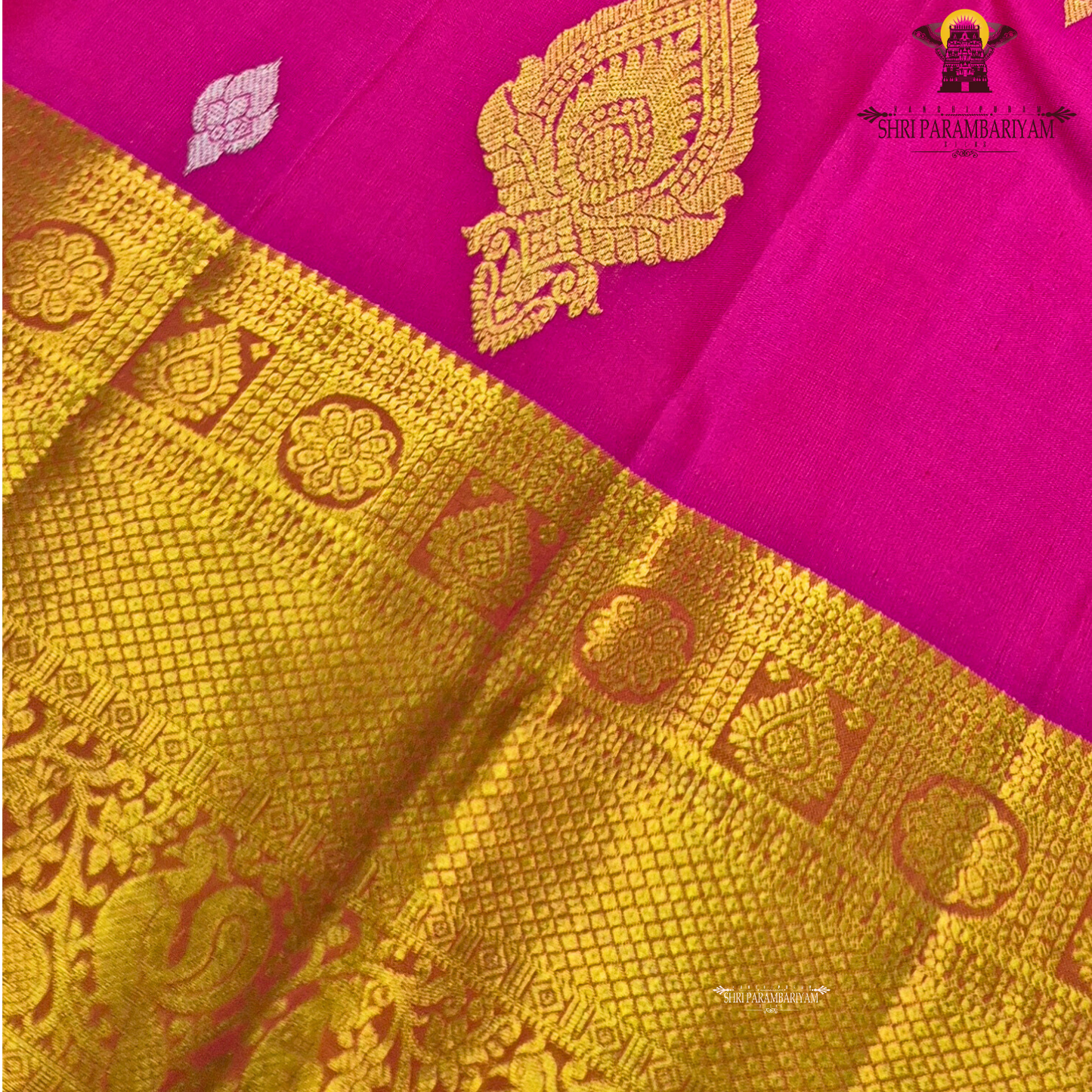 Rani Pink (Deep Magenta Pink) body with a rich Gold Zari border and an Orange-gold selvedge (edge finish) Saree