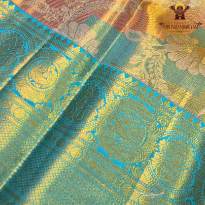 A rich dual-tone combination featuring golden tissue with pastel mint green Saree