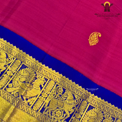Rani Pink body with Royal Blue border and Green edge Saree