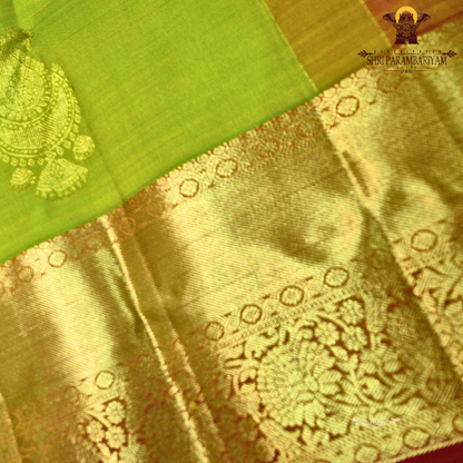 A lime Green (yellowish green tone) with Rich Gold zari border Saree