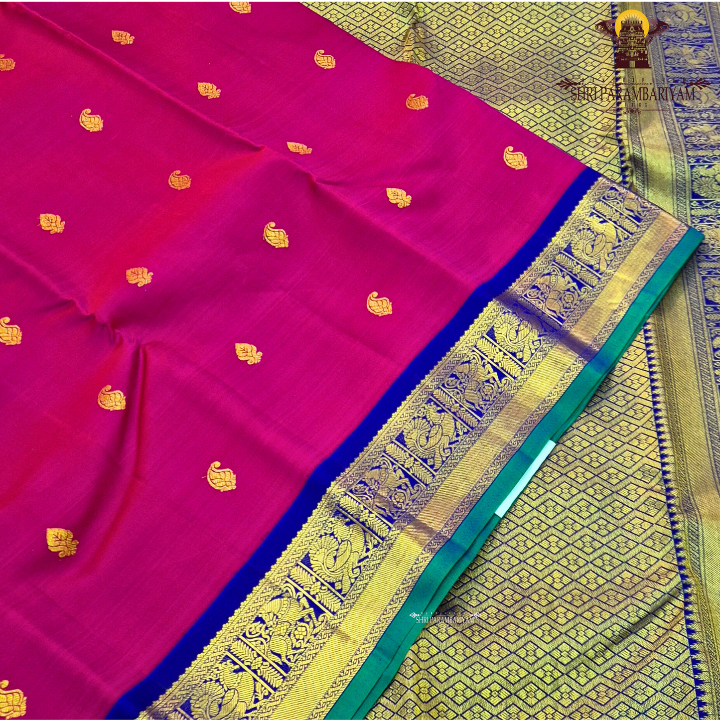 Rani Pink body with Royal Blue border and Green edge Saree