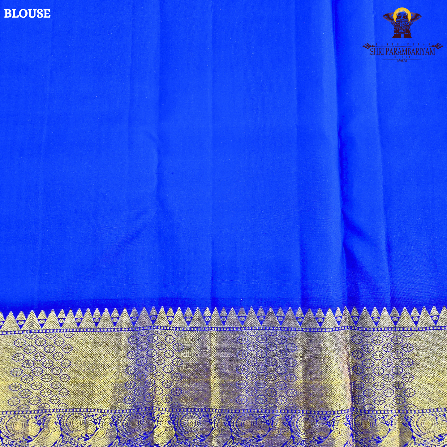 A radiant turmeric yellow body adorned with elegant zari buttas Saree