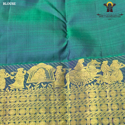 A elegant Dual-tone Teal Green with Royal Blue and Antique Gold Zari Saree