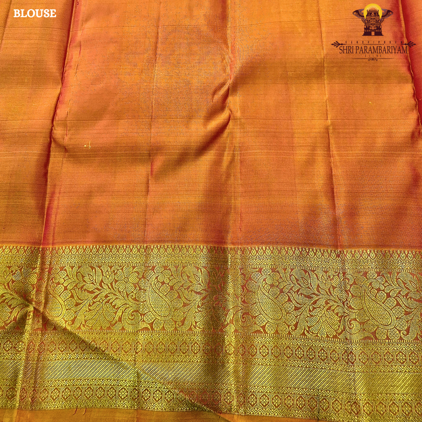 Deep maroon (wine red tone) with a rich contrast of golden zari and orange-toned border Saree