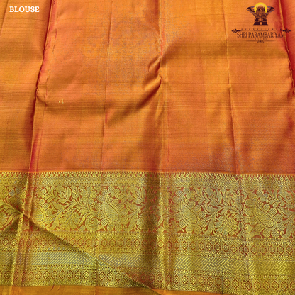 Deep maroon (wine red tone) with a rich contrast of golden zari and orange-toned border Saree
