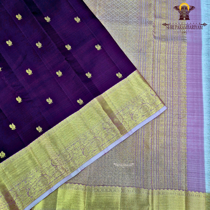 Rich deep maroon (wine shade) body with a lustrous gold zari Saree