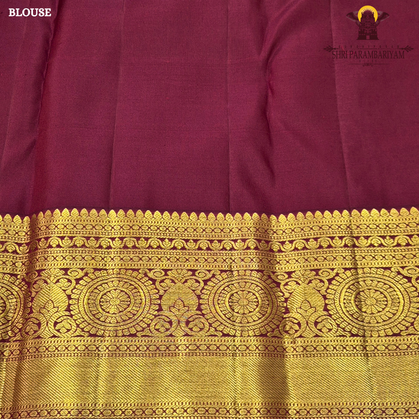 Deep magenta-red (rani red tone) with rich antique gold zari Saree