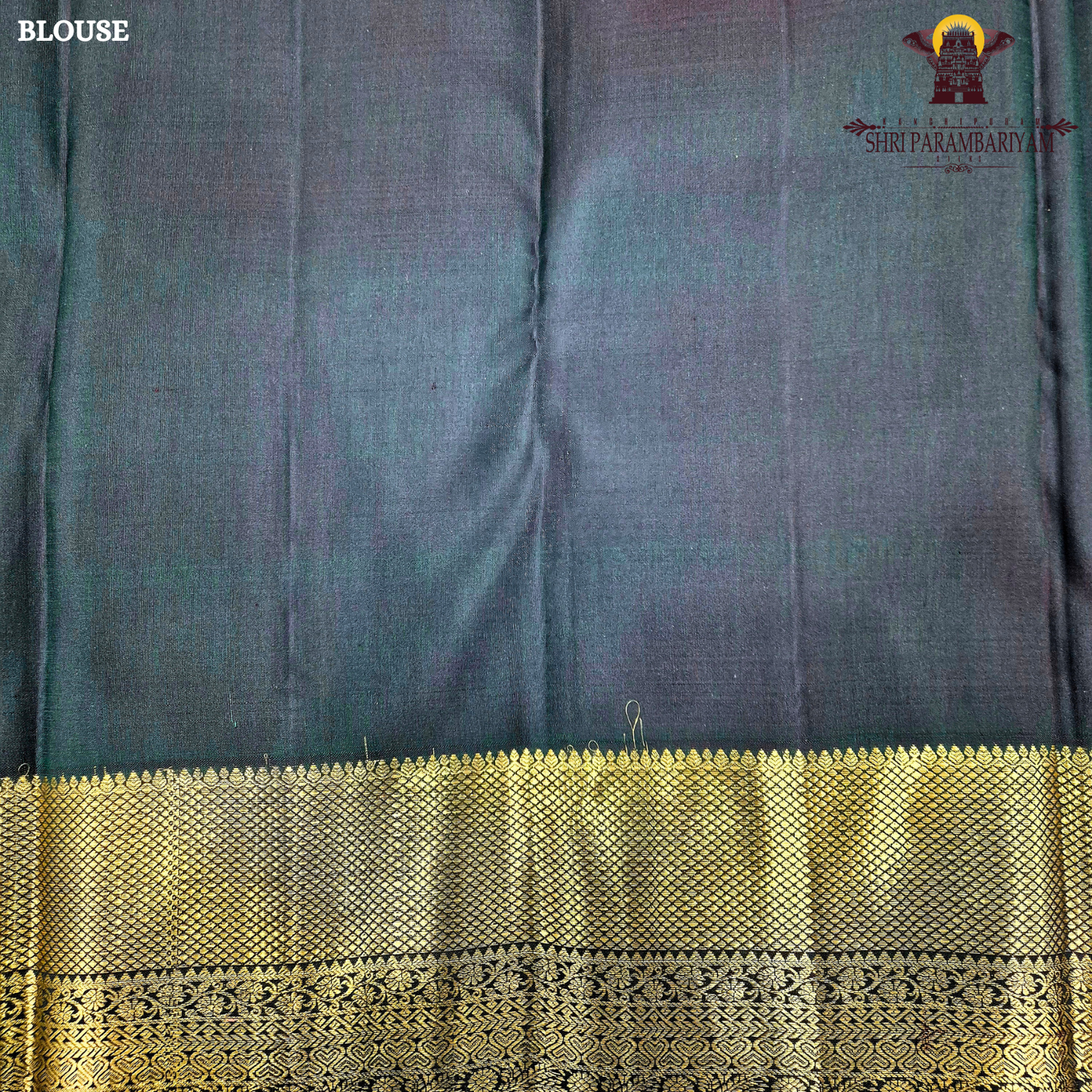 A classic Dark Bottle Green with rich Gold zari Saree