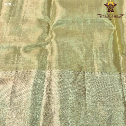 A beautiful light pistachio gold shade that gives a soft and graceful shine Saree