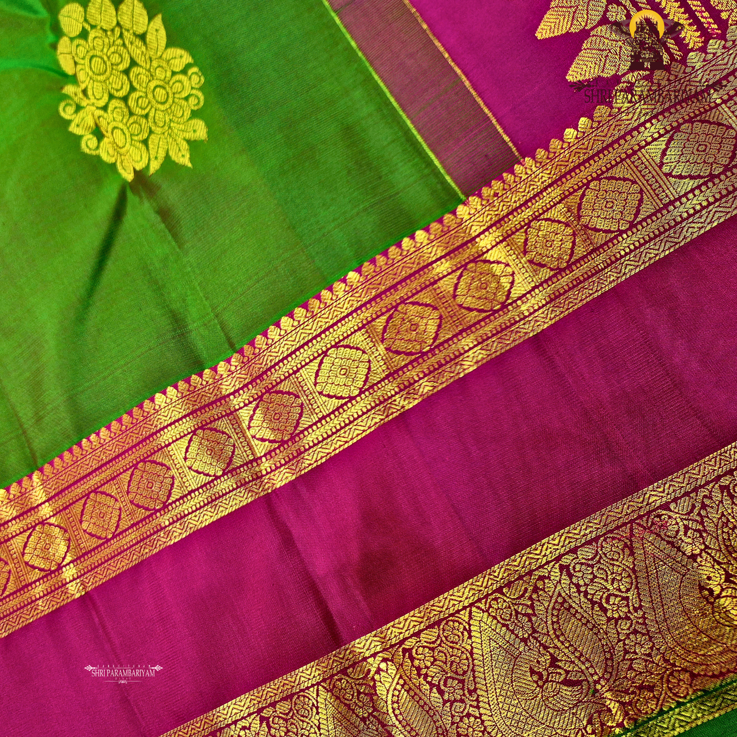 A elegant Bottle Green with Rani Pink contrast and rich Gold zari work Saree