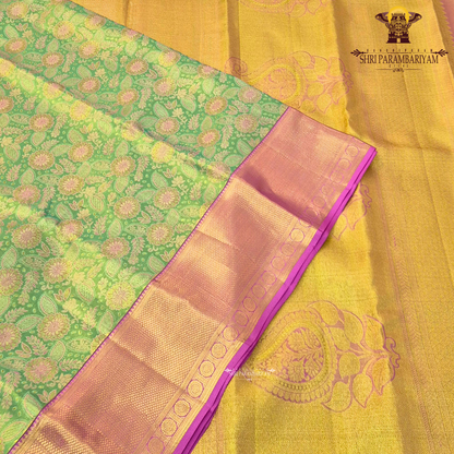 A beautiful leaf green base with pink with magenta-pink border Saree