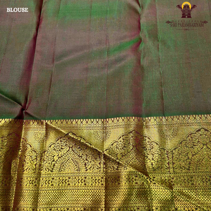 Vermillion Red body with rich Gold zari border and contrast Green edge Saree