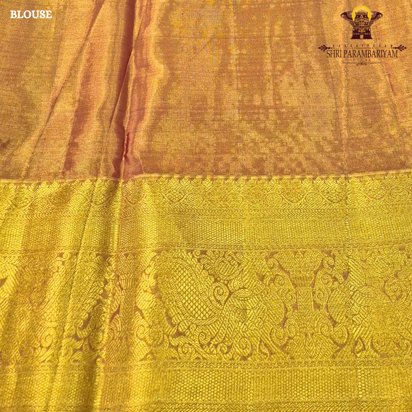 A graceful lavender / soft purple base highlighted with rich golden zari Saree