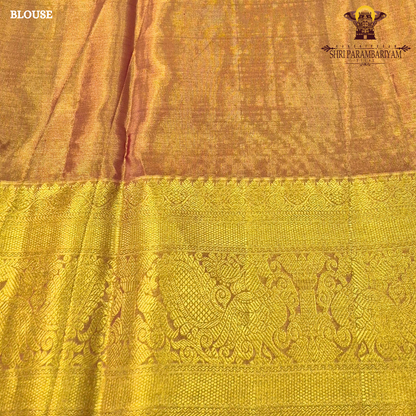 A graceful lavender / soft purple base highlighted with rich golden zari Saree
