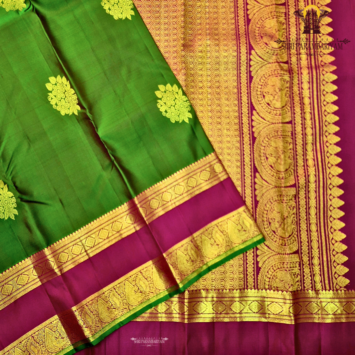 A elegant Bottle Green with Rani Pink contrast and rich Gold zari work Saree