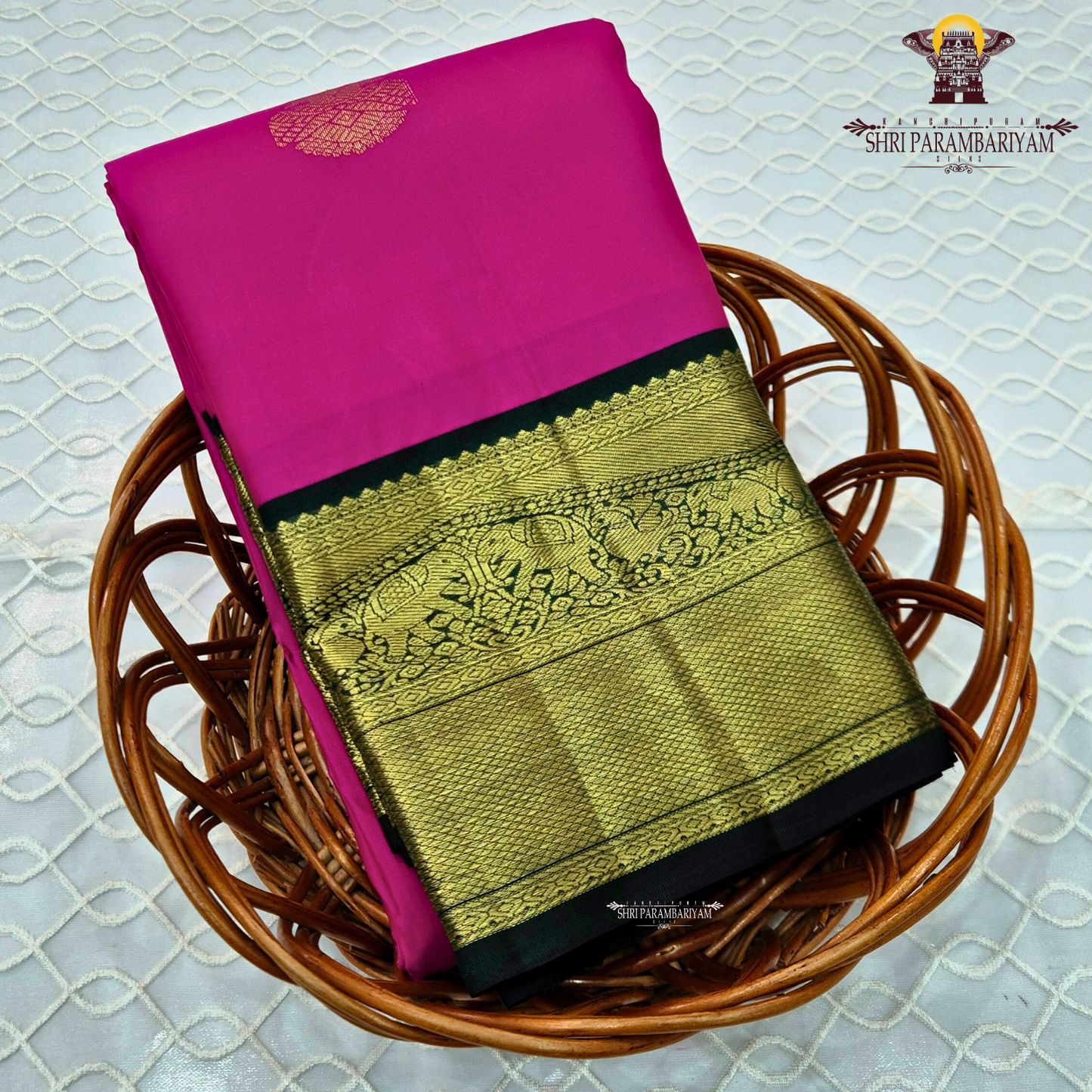 Bright Rani Pink body with Bottle Green border Saree