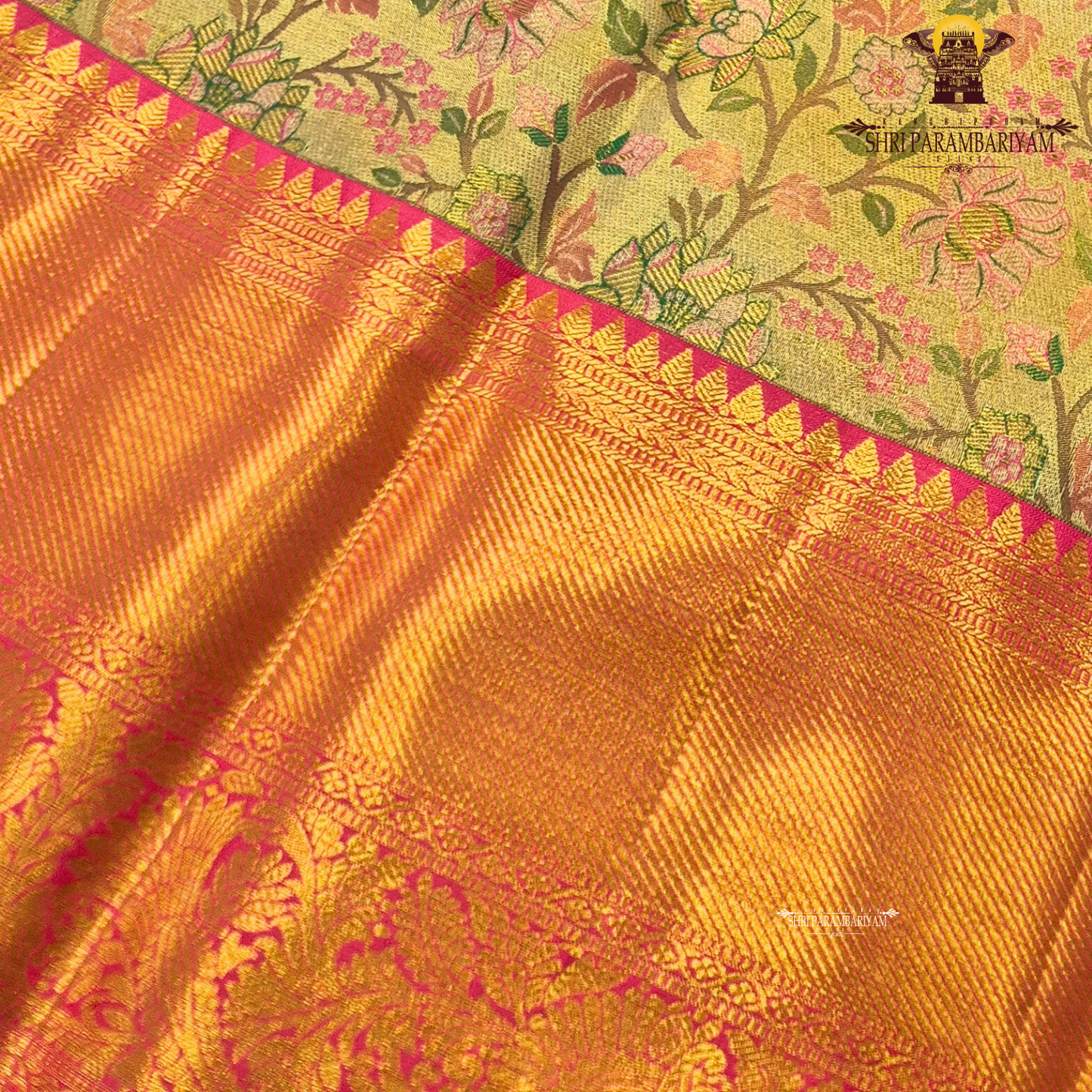 A graceful golden beige / antique gold base with multicolor floral Saree