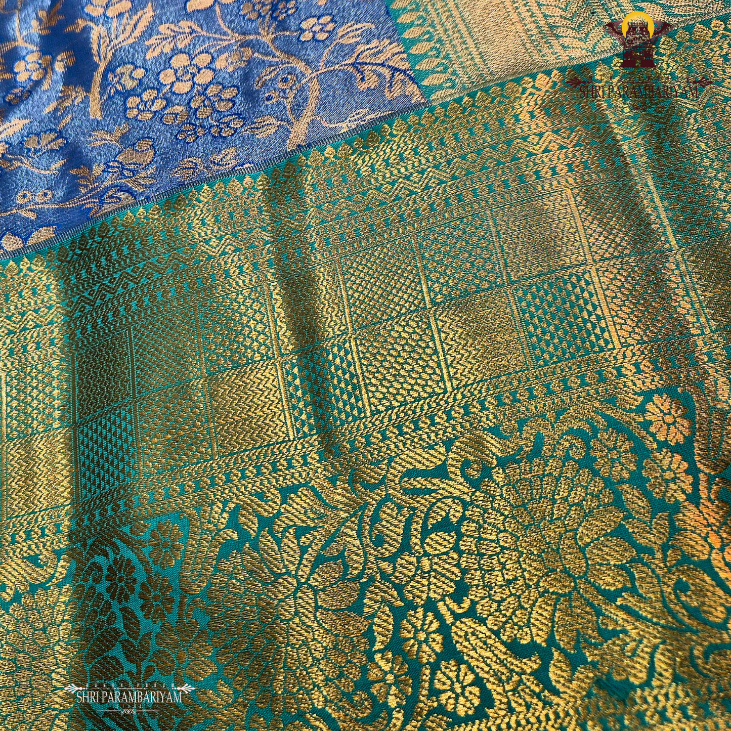 An elegant steel blue / peacock blue Tissue Saree