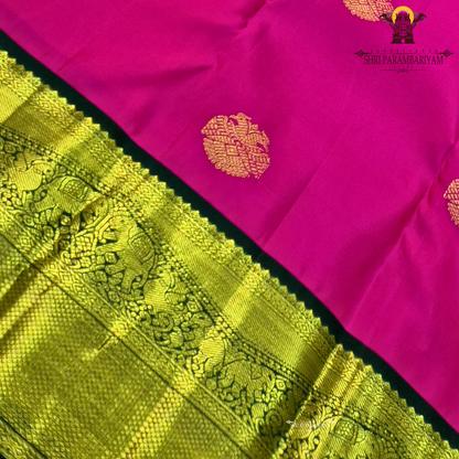 Bright Rani Pink body with Bottle Green border Saree