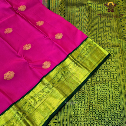 Bright Rani Pink body with Bottle Green border Saree