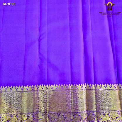 A vibrant Mango Yellow / Golden Orange body with a rich Royal Purple Korvai Border Saree