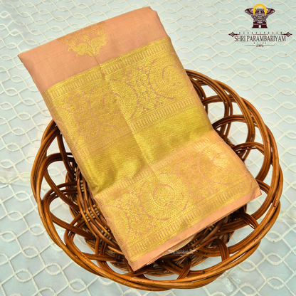 A elegant Soft Peach with Rich Gold Zari Saree