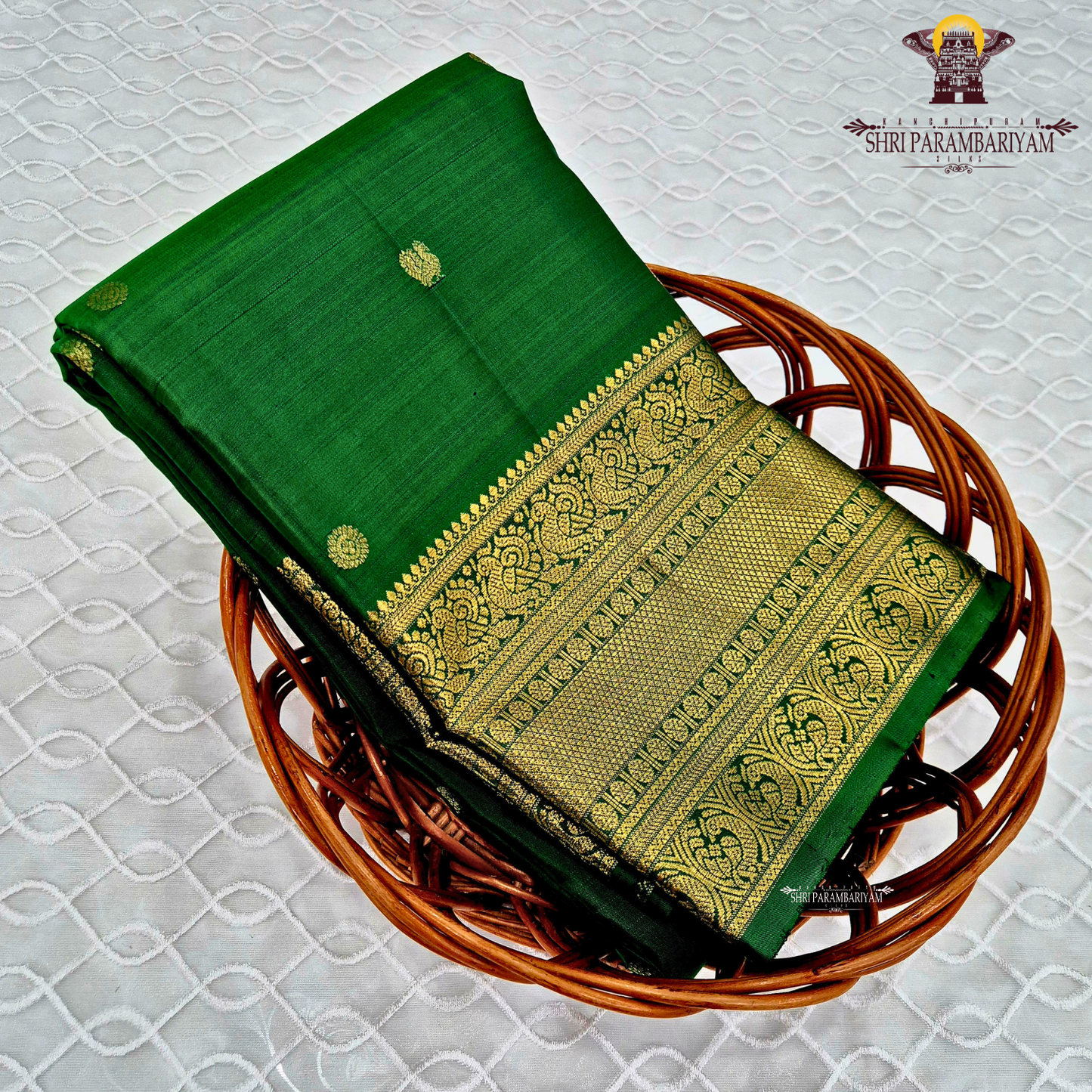 A rich emerald green Saree