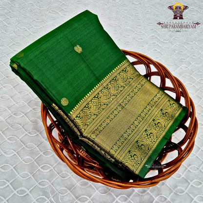 A rich emerald green Saree