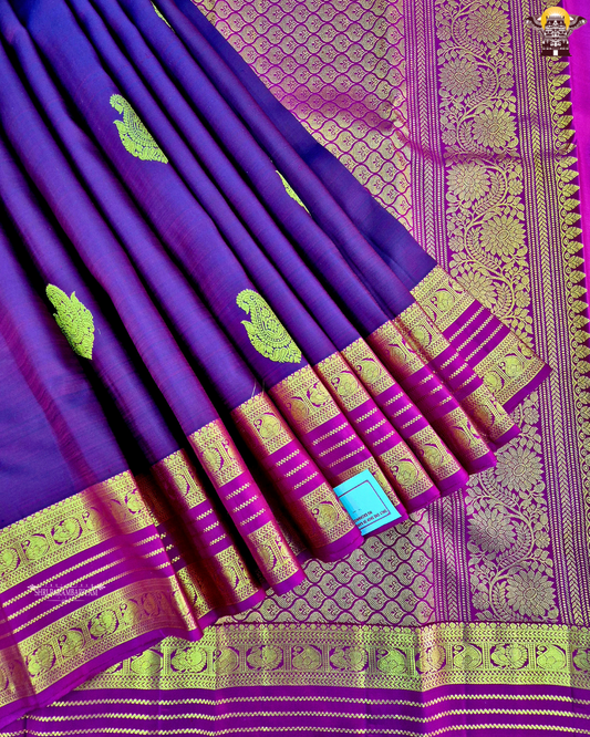 A rich dual-tone deep wine purple with magenta undertones Saree